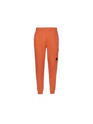 Pomarańczowe spodnie sportowe C.p. Company
