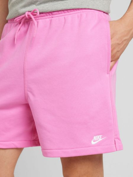 Teplákové nohavice Nike Sportswear ružová