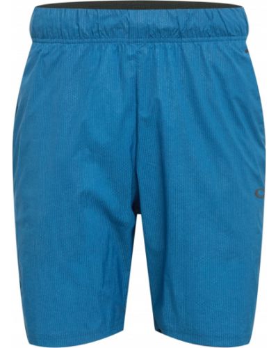 Teplákové nohavice Oakley modrá
