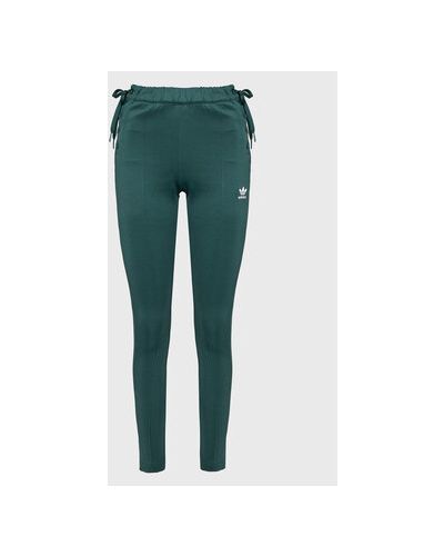 Slim fit priliehavé teplákové nohavice Adidas zelená
