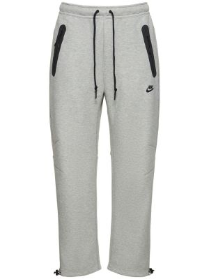 Fleecové kalhoty Nike šedé