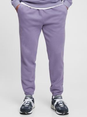 Teplákové nohavice Gap fialová