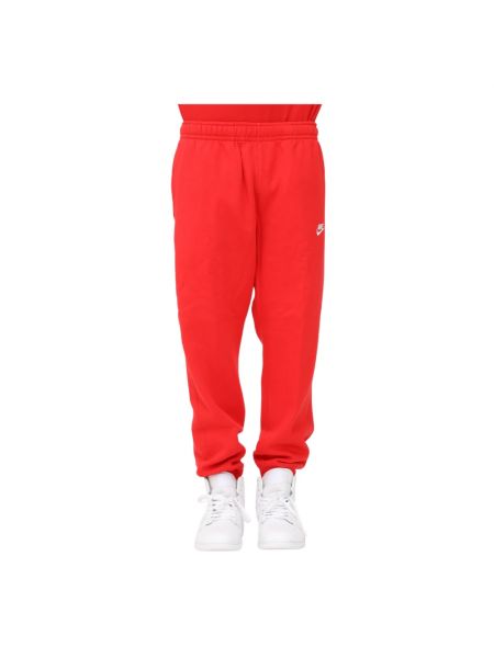 Czerwone spodnie sportowe polarowe Nike