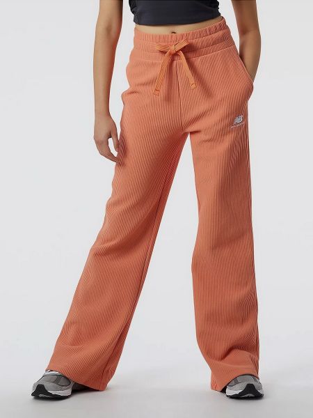 Спортивні штани New Balance помаранчеві