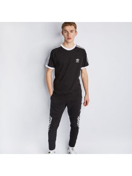 T-shirt a righe Adidas nero