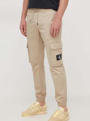Spodnie cargo w jednolitym kolorze Calvin Klein Jeans beżowe