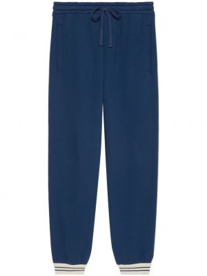 Bavlnené teplákové nohavice s výšivkou Gucci modrá
