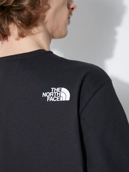 Pamučna majica s džepovima The North Face crna