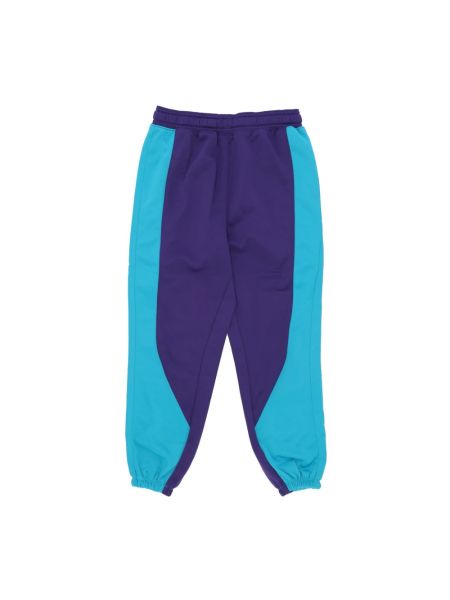 Spodnie sportowe Nike fioletowe