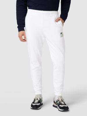 Spodnie sportowe Lacoste białe