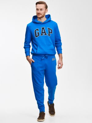 Teplákové nohavice Gap modrá
