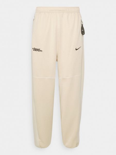 Spodnie sportowe Nike Sportswear beżowe