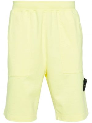 Pantaloni scurți din bumbac din jerseu Stone Island galben