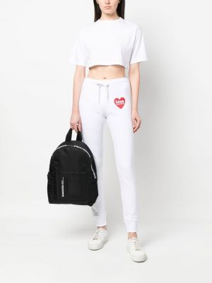 Sportovní kalhoty s potiskem Love Moschino bílé