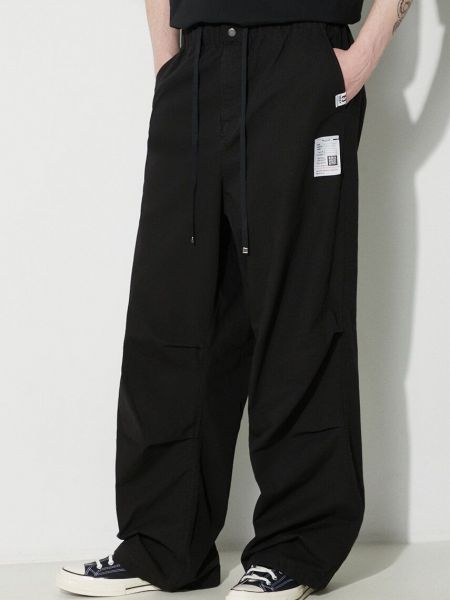 Jednobarevné bavlněné kalhoty Maison Mihara Yasuhiro černé