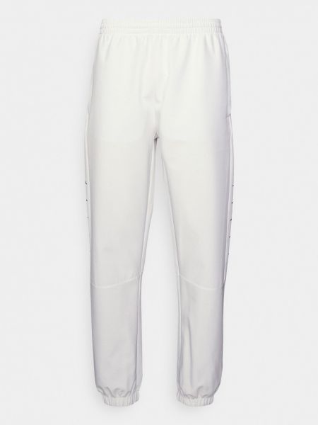 Białe spodnie sportowe Kappa