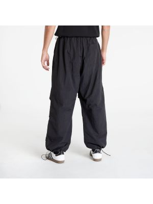 Kalhoty z nylonu Urban Classics černé