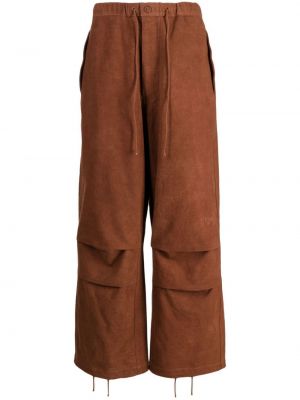 Bavlněné kalhoty s výšivkou relaxed fit Story Mfg. hnědé