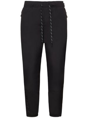 Kalhoty z nylonu Moncler Grenoble černé