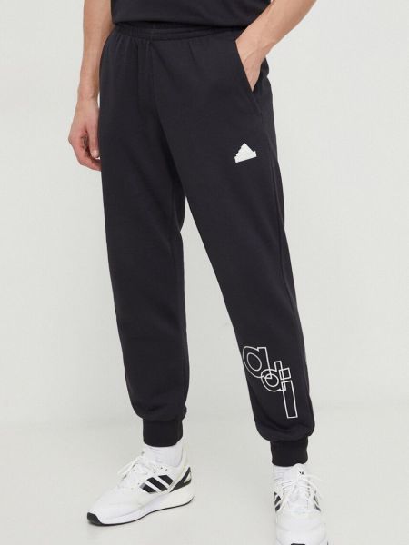 Spodnie sportowe z nadrukiem Adidas czarne