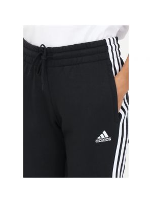 Pantalones de chándal de tejido fleece a rayas Adidas negro