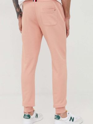 Bavlněné sportovní kalhoty s aplikacemi Tommy Hilfiger růžové