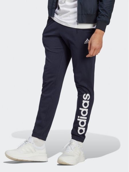 Priliehavé teplákové nohavice Adidas