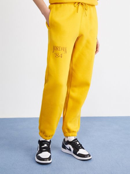 Спортивные штаны Jordan желтые