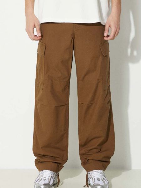 Jednobarevné bavlněné cargo kalhoty Carhartt Wip hnědé
