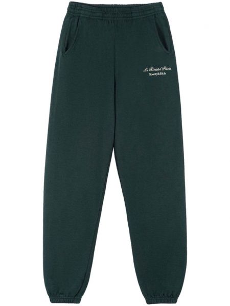 Bavlnené teplákové nohavice Sporty & Rich zelená