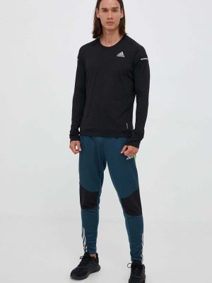 Spodnie sportowe Adidas Performance niebieskie