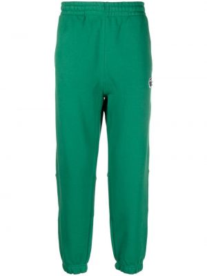 Памучни спортни панталони Lacoste зелено