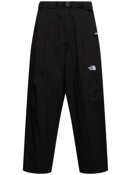 Relaxed fit puuvilla housut The North Face musta