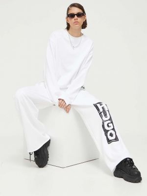 Spodnie sportowe bawełniane z nadrukiem Hugo białe