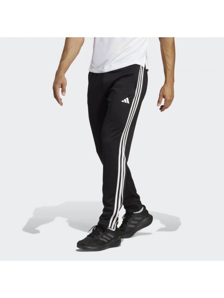 Spodnie sportowe w paski Adidas