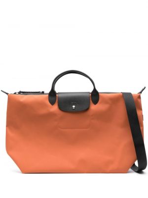 Kovček Longchamp oranžna