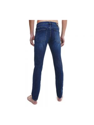 Jeansy skinny na guziki Calvin Klein Jeans niebieskie