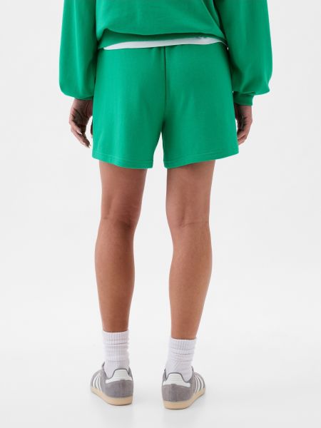Teplákové nohavice Gap zelená
