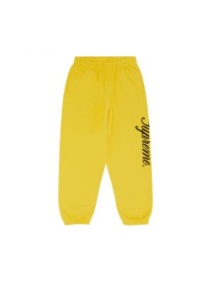 Спортивные штаны с принтом Supreme желтые