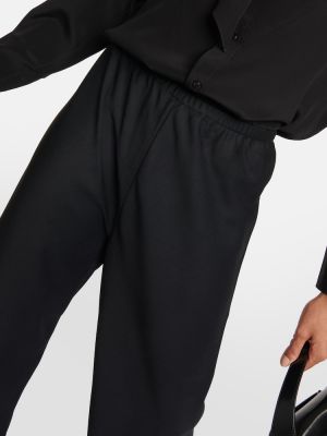 Vlněné kalhoty relaxed fit Wardrobe.nyc černé