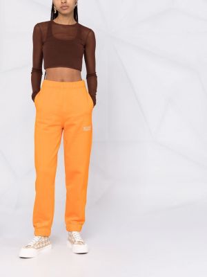 Sportovní kalhoty s výšivkou Ganni oranžové