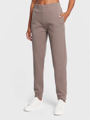 Sportovní kalhoty Calvin Klein hnědé