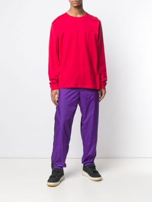 Pruhované sportovní kalhoty Acne Studios fialové