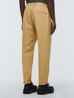 Bavlněné kalhoty Moncler béžové