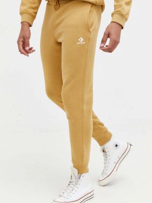 Sportovní kalhoty s aplikacemi Converse hnědé