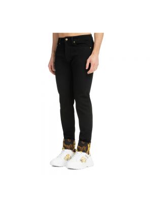 Pantalones con estampado abstracto Versace Jeans Couture negro