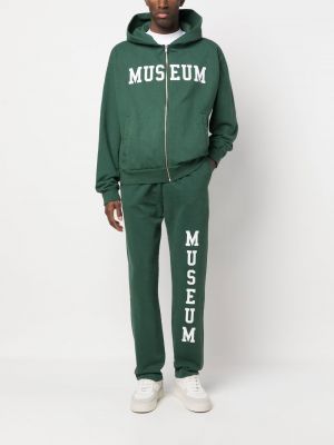 Spodnie sportowe bawełniane z nadrukiem Museum Of Peace And Quiet zielone