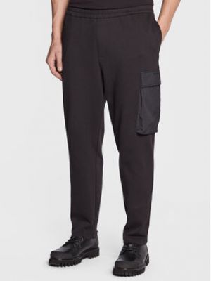 Priliehavé teplákové nohavice Armani Exchange čierna
