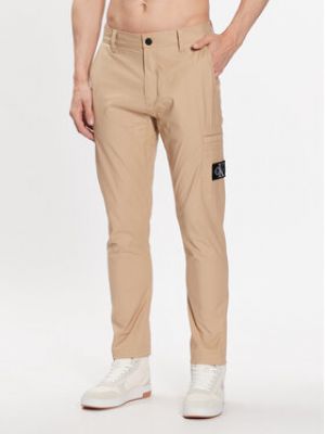 Bavlnené priliehavé nohavice Calvin Klein Jeans béžová