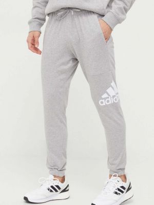 Spodnie sportowe z nadrukiem Adidas szare